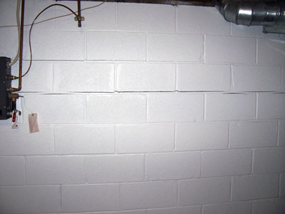 Horizontal crack in foundation block wall.